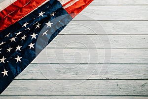 In honor of Veterans Day, American flags against a wooden backdrop