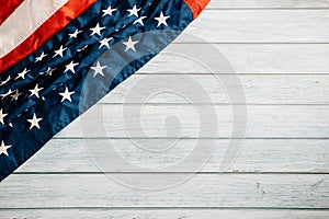 In honor of Veterans Day, American flags against a wooden backdrop