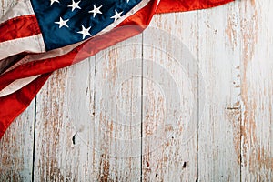 In honor of Veterans Day, American flags against a wooden backdrop