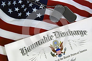 Honorable discharge paper on flag