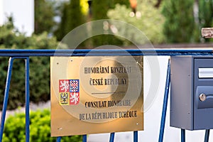 Honorary consulate of Czech Republic in two languages on the main entrance of