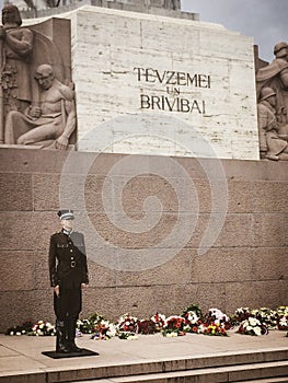 Honour guard in front of freedom monument in Riga Latvia
