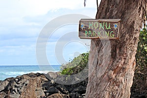 Honu Parking Sign on Turtle Beach in North Shore, Oahu, Hawaii