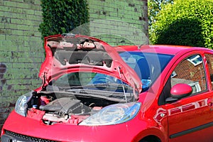 Hood or bonnet open on a vehicle.