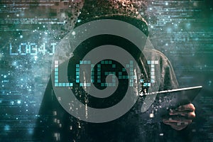 Hooded computer hacker in cybersecurity vulnerability Log4J concept