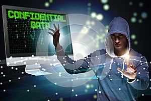 The hooded hacker in data computer security concept
