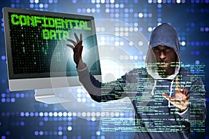 The hooded hacker in data computer security concept