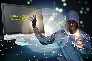 The hooded hacker in data computer security concept