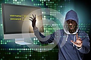The hooded hacker in data computer security concept