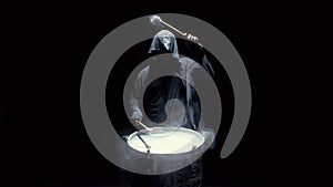 Hooded man beats drum with flour