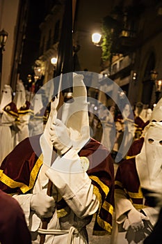 Hooded penitents during the famous Good Friday procession in Chieti (Italy photo