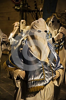 Hooded penitents during the famous Good Friday procession in Chieti (Italy photo