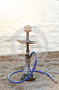 Hookah and tobacoo on a beach