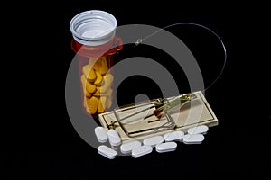 Hooked On Prescription Drugs With Black Background & Mouse Trap