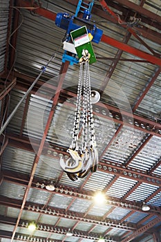Hooks of weigher bridge crane in warehouse photo