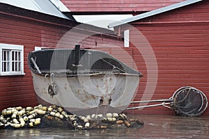 Hoonah, Alaska: A rusty fishing boat and various fishing nets