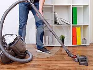 Hoovering a parquet floor