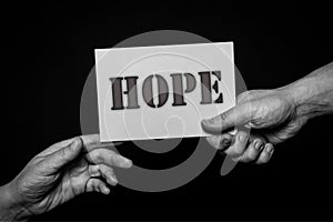 Hope, helping hands concept, offering care, love, hope and support.