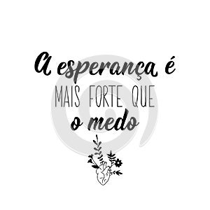 Hope is stronger than fear in Portuguese. Lettering. Ink illustration. Modern brush calligraphy