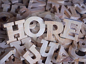 Hope, text words typography written with wooden letter, life and business motivation inspirational