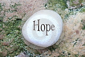 Hope, words printed on white stone