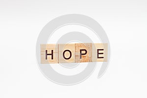 HOPE words on wooden blocks. Optimism concept