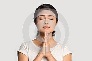 Hopeful Indian woman pray ask feeling superstitious