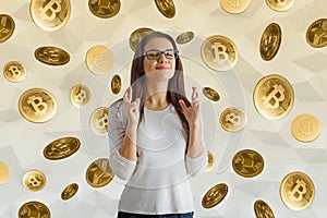 Hopeful woman with bitcoins