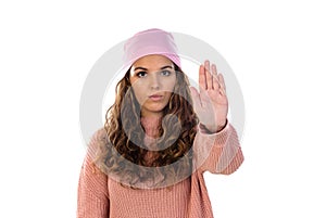 Hopeful woman with cancer wearing a thoughtful pink scarf