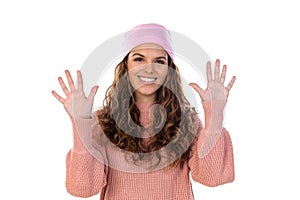 Hopeful woman with cancer wearing a thoughtful pink scarf