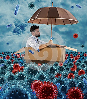 Hopeless businessman floats with a cardboard in a sea of viruses and bacteria. Concept of pandemic