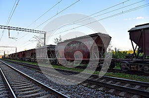 Hopper wagons and rail road cars for transportation of cement, ready-mix and building materials. Shipping by rail from the
