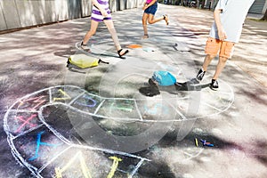 Hopscotch game drawn on the road with chalk