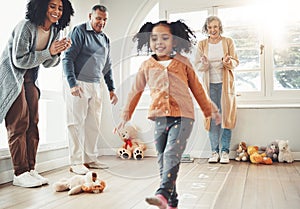 Hopscotch, happy family and parents play with girl having fun, enjoying games and relax together. Childhood