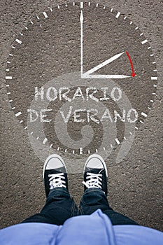 Horario de Verano, Spanish Daylight Saving Time on asphalt with photo