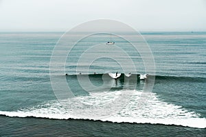 Horizon over the sea. Beautiful seascape with surfing silhouette.