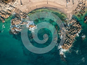 Horizontal aerial view of Conchas Chinas Beach in Puerto Vallarta. Bright clear turquoise water at beach