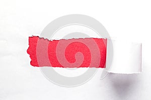 Horizontal background with a torn hole in the paper. Background with a red hole in white paper