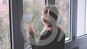 Horizontal background woman in isolation at home for virus outbreak or hypochondria photo