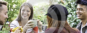 Horizontal banner or header with young people drinking cappuccino and espresso coffee at cafe bar garden - Happy friends talking