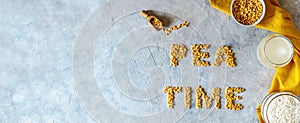 Horizontal banner with pea products - vegan plant-based pea milk, flour and seeds. Concrete background. Copy space photo