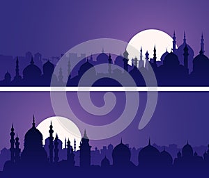 Horizontal banners of eastern city with minarets and domes at night.