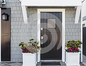 Horizontal of black front door to family home photo