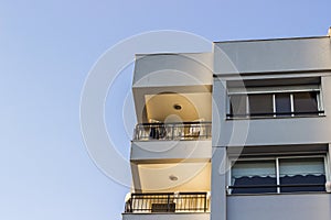 Horizontal close-up corner shot of urban concrete building in city at Turkey