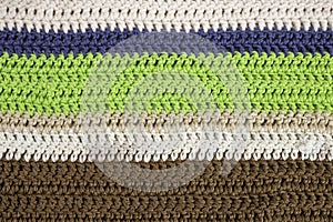 horizontal colored crochet lines pattern, beige, blue, green and brown colors