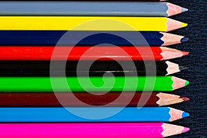 Horizontal colourful stripes of multicoloured wooden pencils background