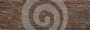 horizontal dark brown brick wall for pattern and background