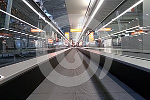 Horizontal escalator at the airport/ details of a slidewalk,