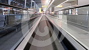 Horizontal escalator at the airport/ details of a slidewalk,