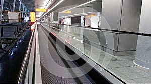 Horizontal escalator at the airport/ details of a slidewalk,